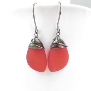Red sea glass earrings wire wrapped with hematite colored wire