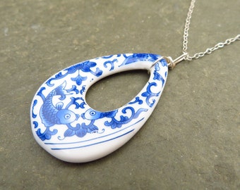 blue and white BROKEN CHINA pendant on 18" silver-plated Chain