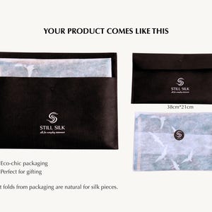 May include: Black packaging with the text "STILL SILK" and a logo. The packaging includes a folded piece of paper with a bird design. The dimensions of the paper are 15 inches by 8.3 inches.