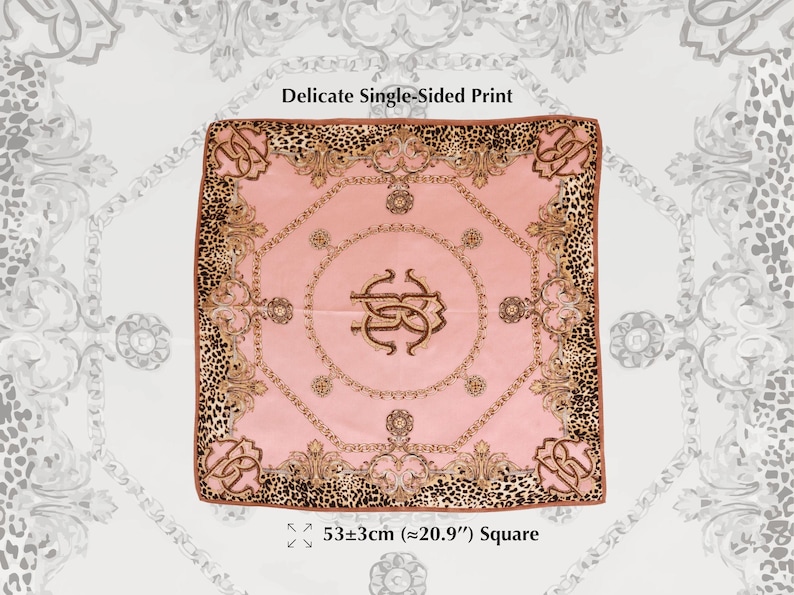 May include: A square pink scarf with a delicate single-sided print. The scarf features a gold and brown ornate design with a leopard print border. The scarf measures approximately 20.9 inches square.