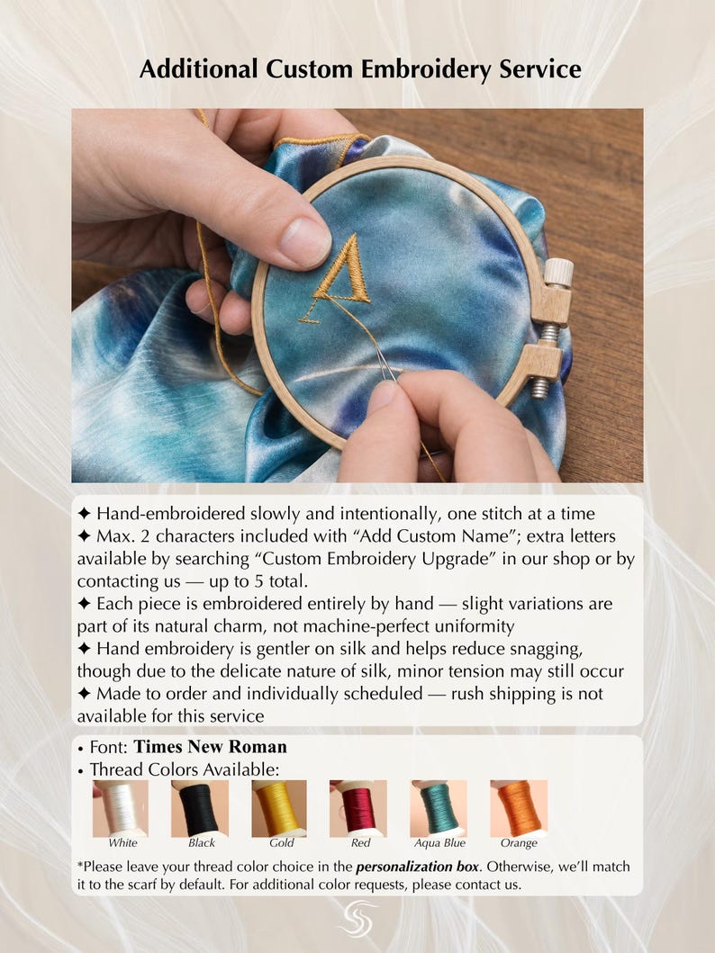 May include: A close-up of a hand embroidering a letter "A" onto a blue and teal fabric using a wooden embroidery hoop. The text "Additional Custom Embroidery Service" is at the top. Thread colors available are white, black, gold, red, aqua blue, and orange.