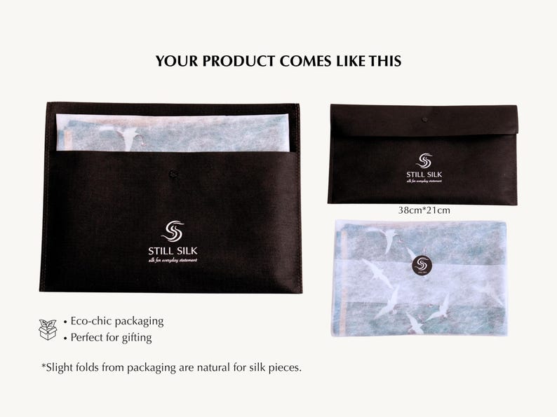May include: Black packaging with the text "STILL SILK" and a logo. The packaging includes a folded piece of paper with a bird design. The dimensions of the paper are 15 inches by 8.3 inches. The text "YOUR PRODUCT COMES LIKE THIS" is at the top.