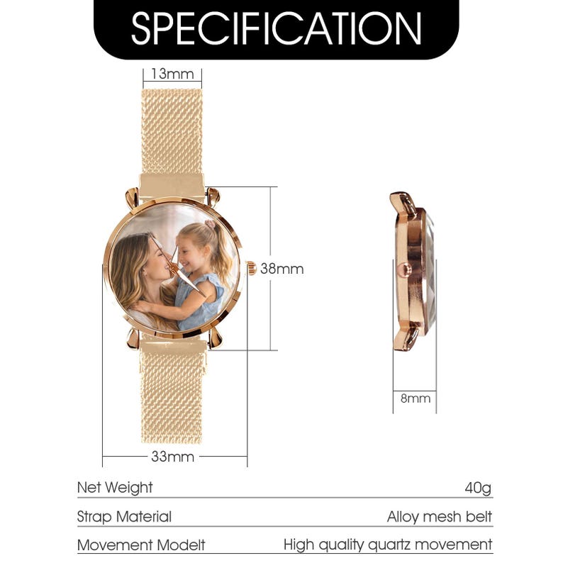 May include: A gold-toned wristwatch with a mesh band and a round face. The watch face features a photo of a woman and a child. The watch is 38mm in diameter and 8mm thick. The band is 13mm wide and 33mm long. The watch weighs 40g.
