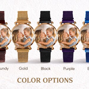 May include: Five personalized wristwatches with gold-tone cases and mesh bands in burgundy, gold, black, purple, and blue. Each watch face displays a photo of a mother and child. The text "COLOR OPTIONS" is below the watches.