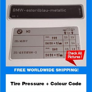 May include: Two rectangular stickers with text. The top sticker reads "BMW-estorilblau-metallic". The bottom sticker has "M3" and tire pressure information. A red banner says "Check All Pictures!". The text "Tire Pressure + Colour Code" is at the bottom.