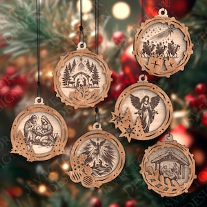 May include: Six wooden Christmas ornaments with detailed laser-cut designs. Each ornament depicts a different Nativity scene, including the Holy Family, angels, and the Three Wise Men. The ornaments are suspended by black cords.