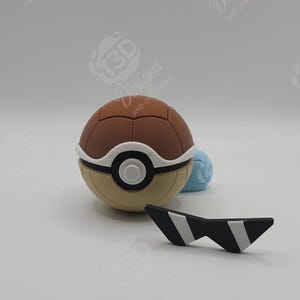 May include: A spherical brown and tan container with a central white and black circular button design, accompanied by a pair of black and white angular sunglasses and a small light blue rounded object positioned behind the main sphere.
