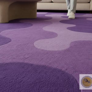 May include: A plush, purple area rug with a wavy, abstract design in varying shades of violet. The rug's texture is visible, and the design creates a flowing pattern across the floor. A person is walking on the rug.