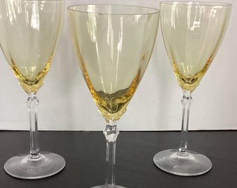 Vintage Fostoria Topaz water goblets from the 1920s or 1930s, featuring a yellow bowl and a clear stem. Set of 6.