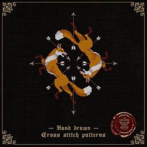 May include: Cross-stitch pattern with four orange foxes pierced by arrows in a symmetrical design. The foxes have white and brown details. Text reads "Hand drawn Cross stitch patterns". The background is black.