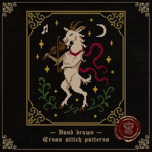 May include: Cross-stitch design of a white goat playing a violin, with a red ribbon, stars, and a crescent moon. The image is set on a black background with decorative borders and the text "Hand drawn Cross stitch patterns".