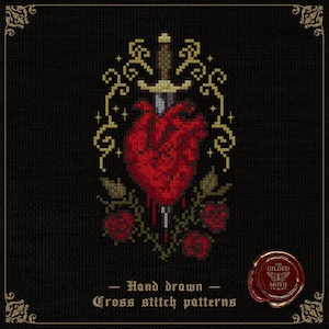 May include: Cross-stitch design with a red heart pierced by a sword, framed by roses and gold detailing. The text "Hand drawn Cross stitch patterns" is displayed on a black background. The Gilded Moth logo is in the bottom right corner of the image.