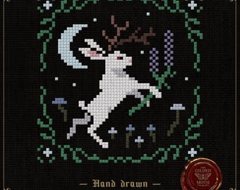 May include: Cross-stitch pattern featuring a white rabbit with antlers leaping towards a crescent moon. The design includes green vines, purple flowers, and the text "Hand drawn Cross stitch patterns" on a black background.