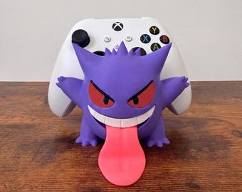 Soporte para mando de Gengar (opción de ojos rojos o blancos) / Decoración de escritorio hecha por fans de Pokémon / Accesorio para consola / Regalo para gamers impreso en 3D
