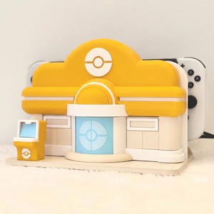 Whimsical Theme Pokopia Poke Center Nintendo Switch 1 or 2 Dock | Multiple or Personalised Colours Available | 3D Printed Gift Yellow