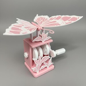 Flapping Dancing Butterfly Wings Hand-Crank Fidget Toy – Interactive Nature 3D Printed Decor Pink and White