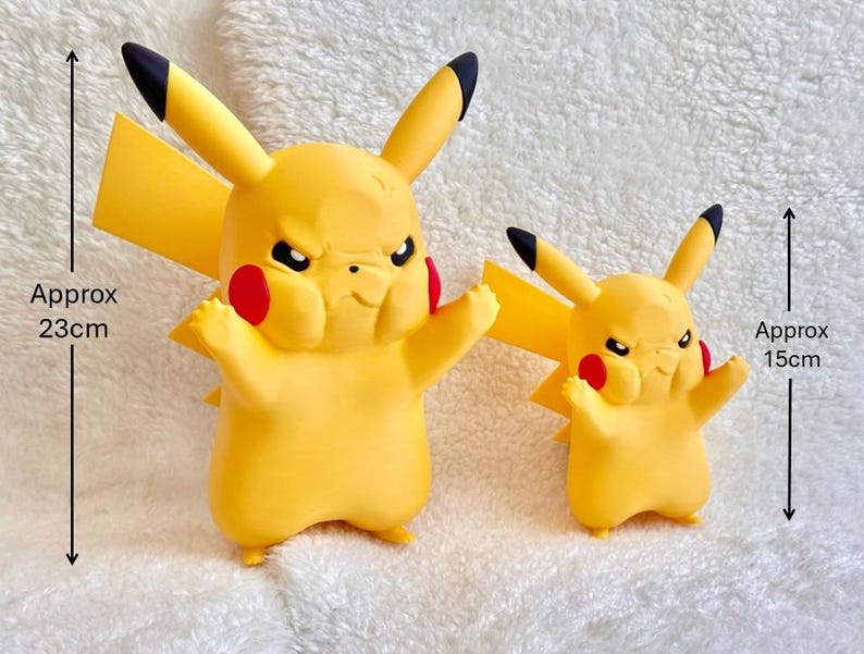 May include: Two yellow Pikachu figures with black-tipped ears and red cheeks, both displaying an angry facial expression. The larger figure measures approximately 9.06 inches in height, while the smaller figure measures approximately 5.91 inches.