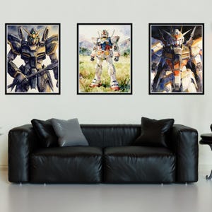Three framed watercolor gundam wallpapers hd wallpaper 4k prints hanging in a gallery row above a black leather sofa. The set features the Deathscythe and other iconic mecha, showcasing how mobile suit gundam wing wallpaper art can serve as sophisticated interior design.