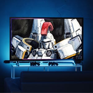 A large living room television screen displaying a high-definition, wide-format mobile suit gundam wing wallpaper portrait of the Tallgeese mecha. Enhanced by a cool blue LED backdrop behind the media console, it provides premium ambient workspace and entertainment center inspiration.