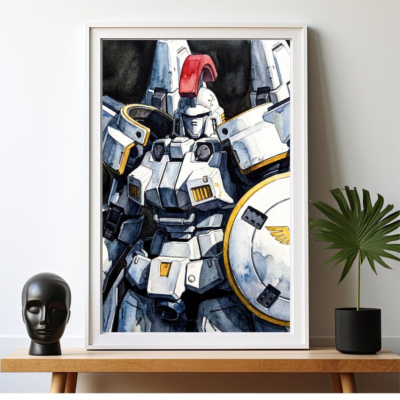 A large white-framed robot art print of the tallgeese gundam sitting gracefully on a light wood console table. Accompanied by a minimalist black head sculpture and a potted palm leaf, this mockup highlights how a mobile suit gundam wing wallpaper concept translates into elegant home staging.