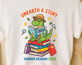 Unearth a Story Summer Reading 2026 T-Rex t-shirt, Funny Dinosaur Reading Quote Tee, Summer Jurassic Adventures, Unisex T-Shirt