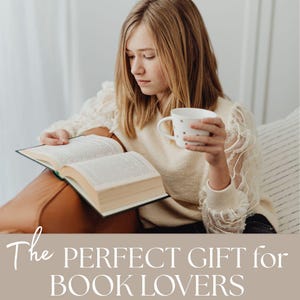 A young woman is sitting on a couch, reading a book and holding a coffee mug, with the text "The perfect gift for book lovers" overlaid on the image.