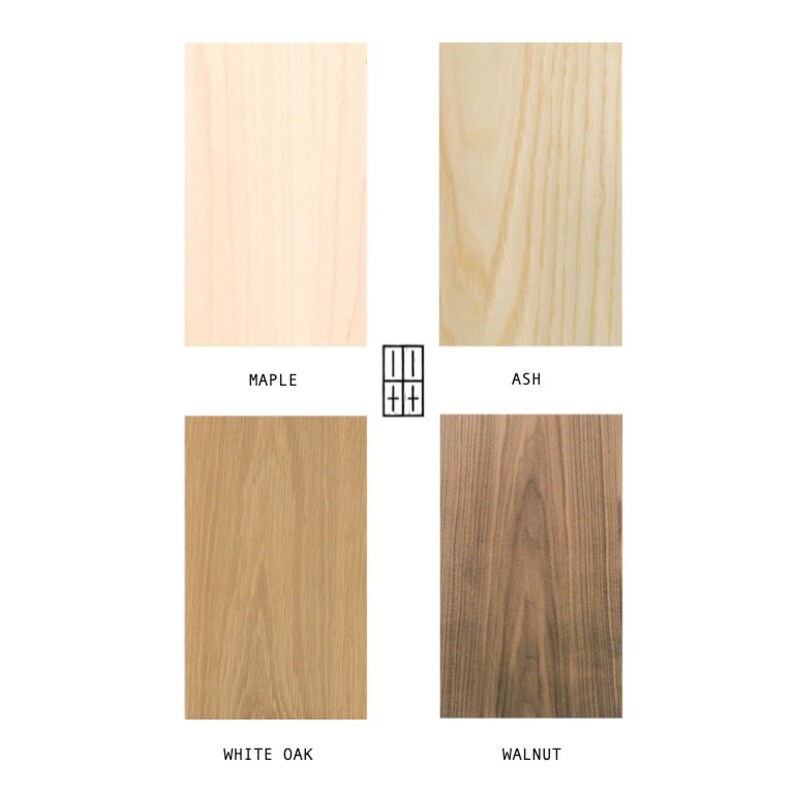 May include: Four wood samples, each showing the grain of a different type of wood: maple, ash, white oak, and walnut.