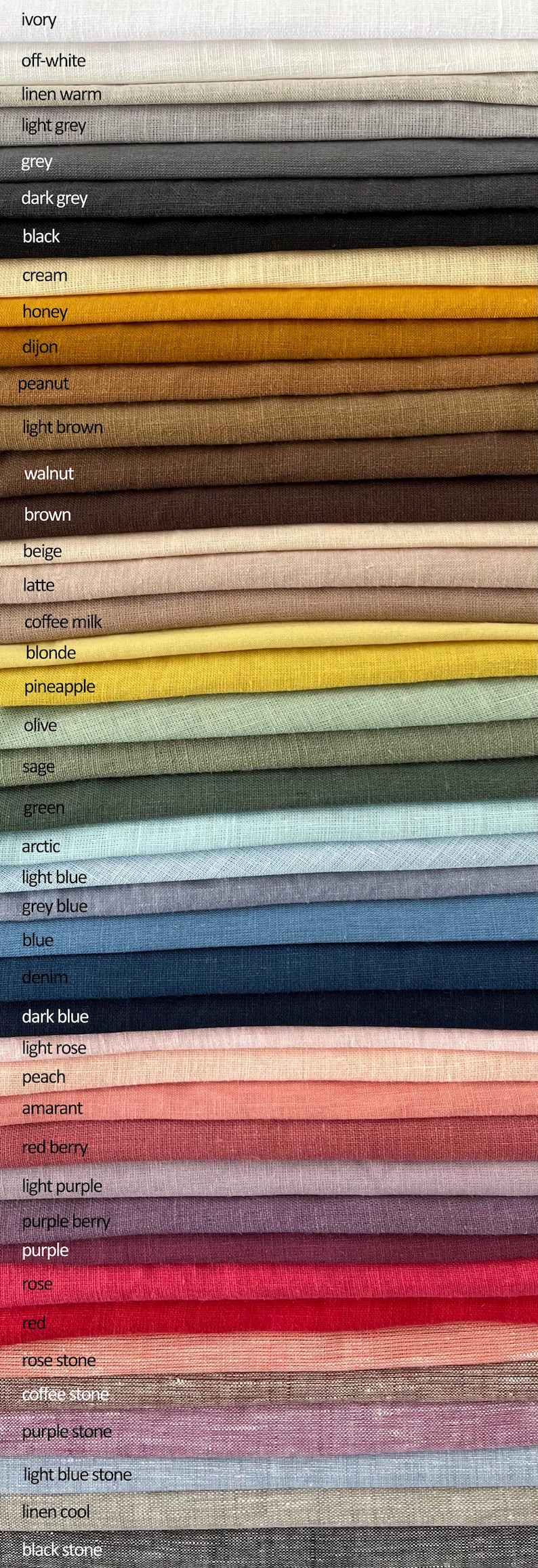 May include: A fabric color swatch card featuring a variety of colors, including ivory, black, and shades of grey, brown, and blue. The card displays the names of the colors, such as "honey", "denim", and "red berry".