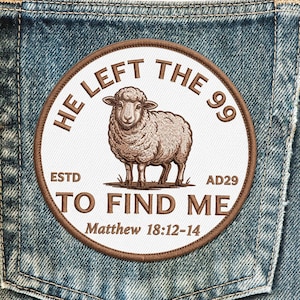 May include: Embroidered patch with a brown sheep illustration and the text "HE LEFT THE 99 TO FIND ME" in a circular design. The patch also includes "ESTD AD29" and a Bible verse reference. The patch is sewn onto a denim pocket.