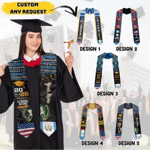 May include: A graduation stole with a black background, featuring the text "20 class of 26 SCHOOL NAME" and the American flag. The stole is worn by a person in a graduation gown. Additional designs are shown.