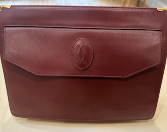 Bolso de mano de piel color burdeos para mujer Must De Cartier Paris, auténtico.