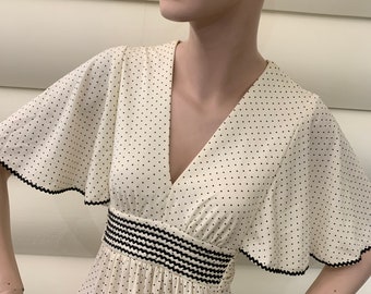 Cream Maxi Dress with Micro Dot Print | Flutter Sleeves | Empire Waist | Black Bric A Brac Details | Set In Waist Tie | Semi Sheer | Small