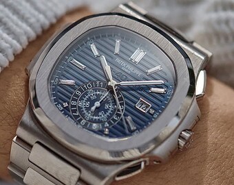 PATEK PHILIPPE Nautilus Cronografo con diamanti quadrante blu orologio da uomo articolo n. 5976-1G-001