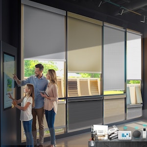 May include: A family examines window shades in a showroom. Several shades are displayed in various colors, including gray, beige, and white. Fabric samples are visible, along with smart home devices and shade control options. The scene suggests a focus on home decor and window treatments.