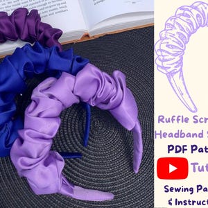 May include: Three satin ruffle scrunchie headbands in shades of purple and blue. The headbands are on a dark surface next to an open book. Text on the right side reads "Ruffle Scrunchie Headband Sewing PDF Pattern Tutorial Sewing Pattern & Instructions."