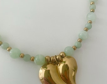 Ketting van natuurlijke jaspis en agaat met een hanger van roestvrij staal. Handgemaakte ketting met fijne kralen voor dames.