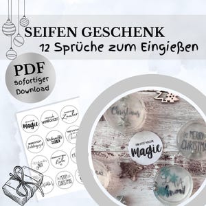 Pode incluir: Um download digital com etiquetas de presente de sabão com texto em alemão. A imagem mostra uma variedade de etiquetas redondas com frases como "Magie" e "Merry Christmas", juntamente com ornamentos de sabão transparentes. Um esboço de uma caixa de presente também está incluído.