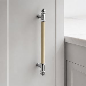 May include: A vertical cabinet pull handle featuring a cylindrical cream-coloured centre grip with polished chrome metal ends and mounting brackets. The top chrome section is engraved with the word Mason in a clear, sans-serif black font.
