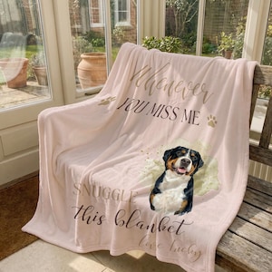 May include: A light pink plush blanket with the text "Whenever You Miss Me, Snuggle This Blanket, Love Lucky." A watercolor image of a Bernese Mountain Dog is featured on the blanket.