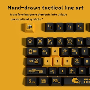 May include: Close-up of a keyboard with black and yellow keys. The keys feature hand-drawn tactical line art, including weapon and game-related symbols. The text "Hand-drawn tactical line art" is at the top.