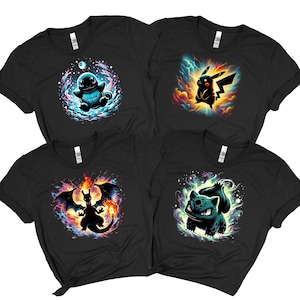 May include: Four black t-shirts featuring colorful graphic designs of cartoon characters. Each shirt displays a different character: a blue turtle, a yellow creature, a black dragon, and a green plant-like creature. The designs are set against vibrant, swirling backgrounds.