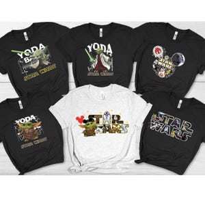 Group of black and white t-shirts featuring Star Wars DTF heat transfer designs, including Baby Yoda, Darth Vader, and Star Wars logos applied on fabric."
