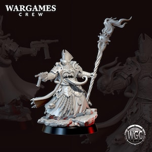 May include: A light gray miniature figure from Wargames Crew featuring a creature with a long tongue, sharp teeth, and a tall hat. The figure wears armored robes with chains and skulls, holds a pistol, and carries a staff topped with flames.