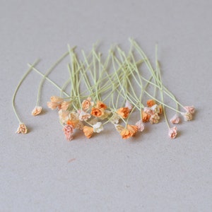 Papieren bloemen van 5 mm / 40 gemengde oranje tinten, bloemen van gipskruidpapier
