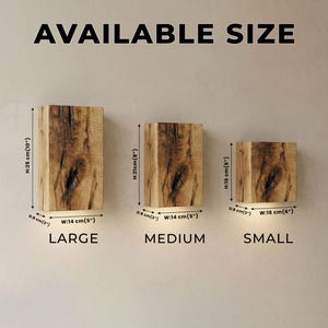 May include: Three wooden wall sconces in varying sizes: large (10" high, 5" wide), medium (8" high, 5" wide), and small (6" high, 6" wide). Each sconce is rectangular, made of natural wood, and has a warm, rustic appearance. The text "AVAILABLE SIZE" is at the top.