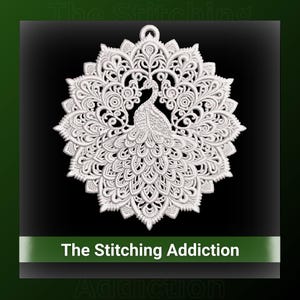 May include: A white, intricate peacock design with a detailed openwork pattern. The peacock's tail feathers are fully displayed. The design is circular and has a loop at the top for hanging. Text at the bottom reads "The Stitching Addiction."