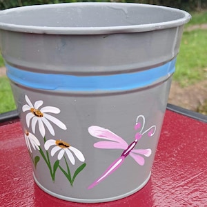 Small folk art plant pot.