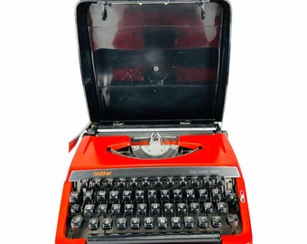 Olivetti Dora タイプライター — ビンテージの赤い手動タイプライター