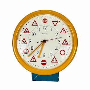 Kundo wall clock with traffic signs | Yellow plastic | 1970s