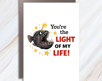 Tarjeta de San Valentín con un pez rape: un caprichoso saludo de amor con rosas y estrellas VC30